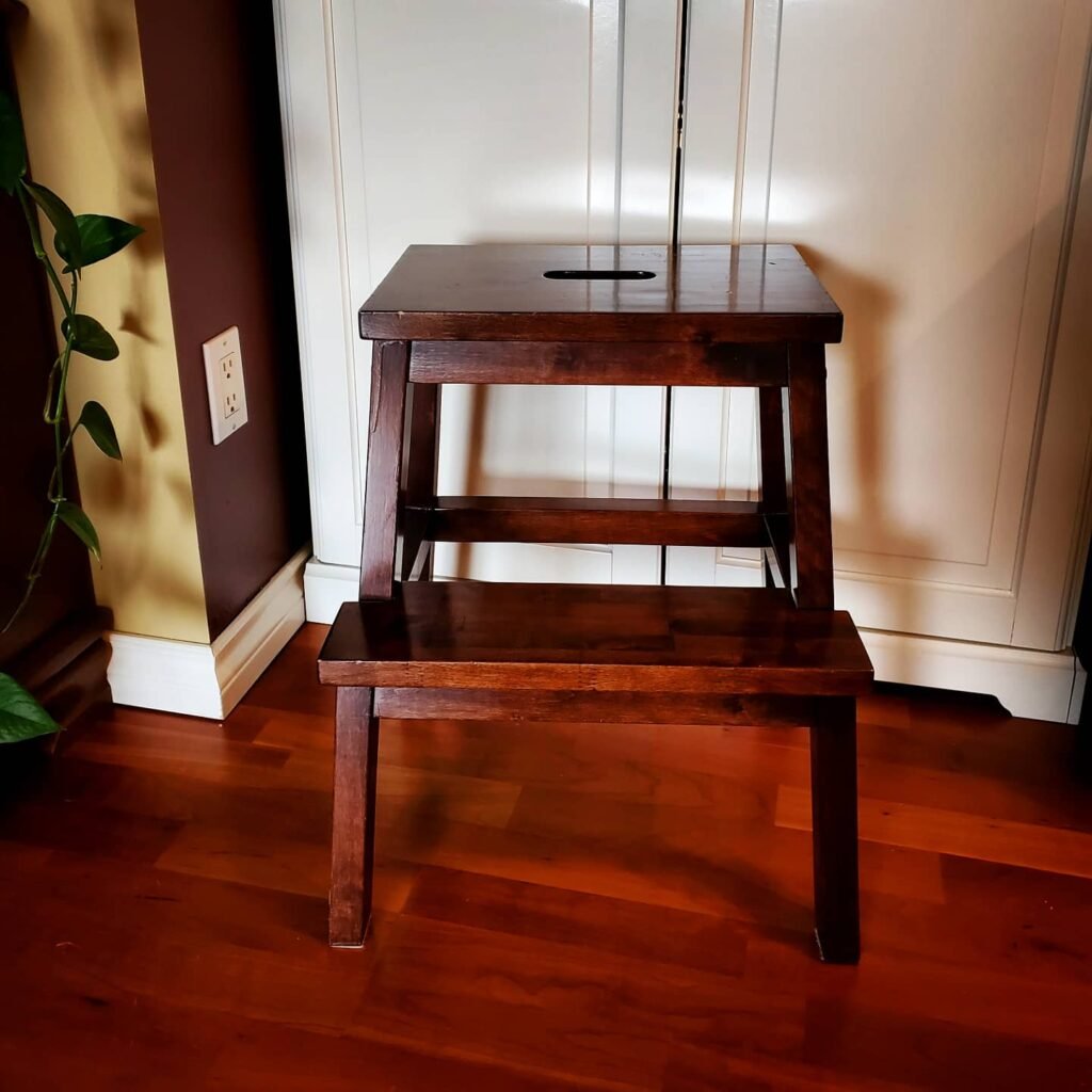 Cottage in the Sky: A step-stool is not only to reach for things up high, it can be used as a seat and an occasional table.